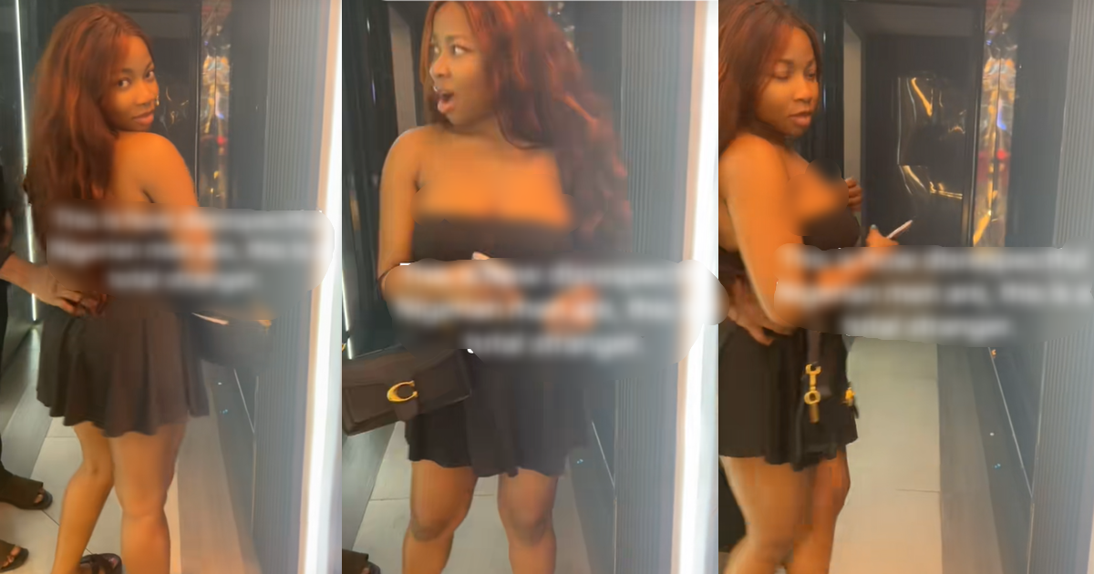 Lady astonished after an unknown man held her by the waist while taking photos at a nightclub (WATCH)